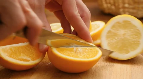 Hands cutting fresh orange Stock Footage 67158421