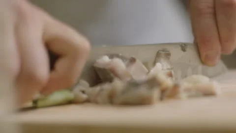 Hands cutting herring on the table Stock Footage 198005464