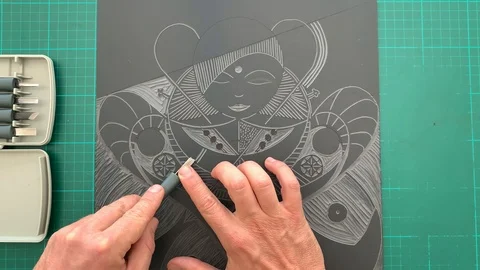 Hands cutting a Lino Cut. Stock Footage 116660723