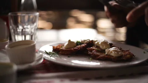 Hands cutting meat on a plate Close-up Lunch Dinner Stock Footage 150275543