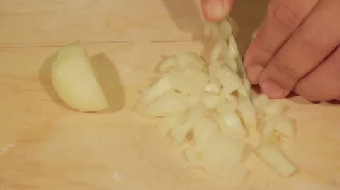The hands cutting onions on a board Stock Footage 68566741
