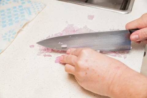 Hands cutting onions Stock Photos