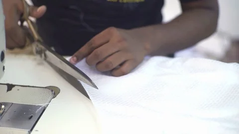 Hands Cutting Out Fabric With Tailor Scissors For Sewing In Textile Factory Stock Footage 113078480