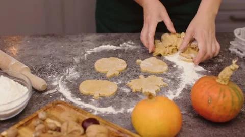 Hands cutting out raw cookies shape form from dough pastry put homemade biscuits Stock Footage 219967688