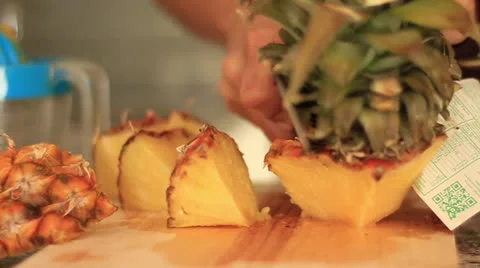 Hands cutting pineapple Video stock 22642710