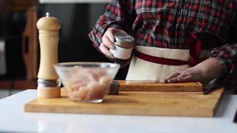 Hands cutting raw chicken (meat) Stock Footage 231794349