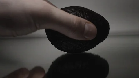 Hands cutting a tasty avocado. dark, mirror Stock Footage 87796960