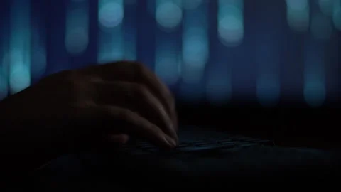 Hands of a cybercriminal working with a computer keyboard. Stock Footage 260841740