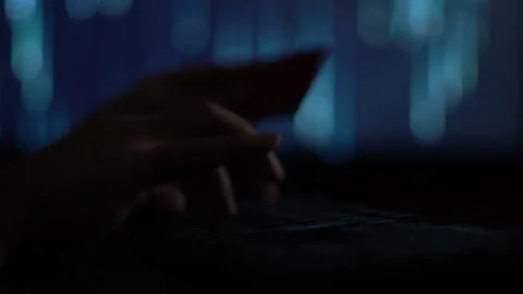Hands of a cybercriminal working with a computer keyboard. Stock Footage 260841750