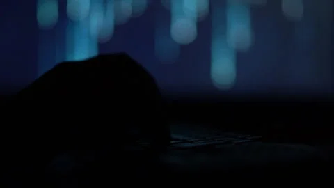 Hands of a cybercriminal working with a computer keyboard. Stock Footage 260841877