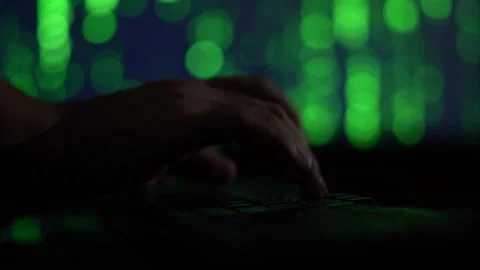 Hands of a cybercriminal working with a computer keyboard. Stock Footage 260842036