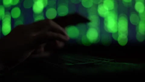 Hands of a cybercriminal working with a computer keyboard Stock Footage 260842201