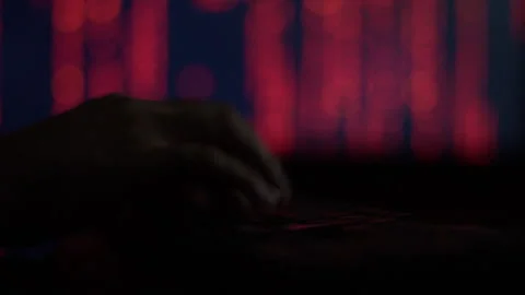 Hands of a cybercriminal working with a computer keyboard. Stock Footage 260842518