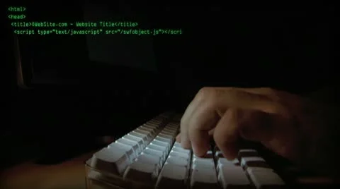 Hands in the Dark Writing Code on a Computer Keyboard Stock Footage