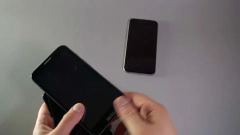 Hands Dealing Smartphones Like Cards Vídeo Stock 334750767