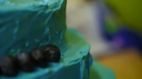Hands decorating blueberry cake Stock Footage 55671376