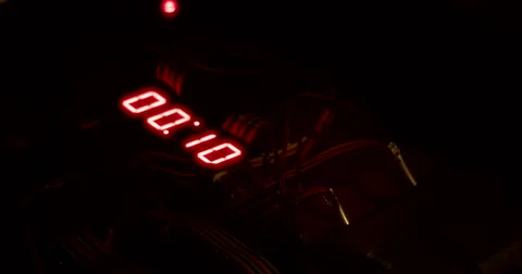 Hands Defuse Bomb as Timer Counts Down Stock Footage 60679640