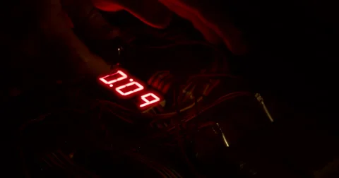 Hands Defuse Bomb as Timer Counts Down Stock Footage 60680113