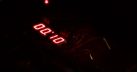 Hands Defuse Bomb as Timer Counts Down Stock Footage 60680114