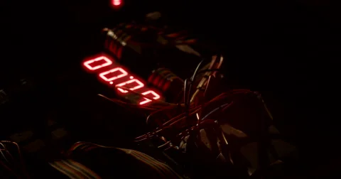 Hands Defuse Bomb as Timer Counts Down Stockbeeldmateriaal 60680208