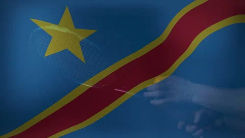 Hands with Democratic Republic of Congo flag and digital grid pattern in Stock Footage 303441765