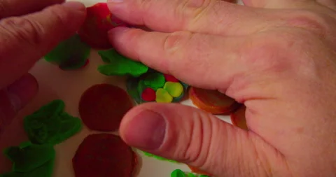 Hands of a designer placing abstract design Stock Footage 331600381