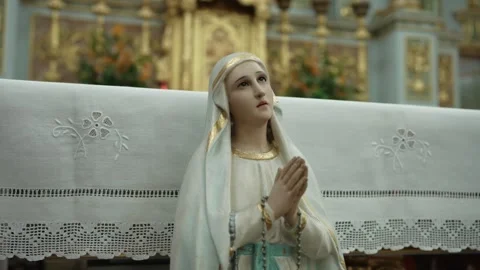 Hands of devotion raised in porcelain grace before golden altar of silent faith Video stock 313097457