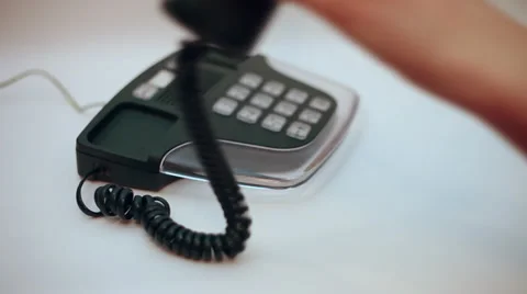 Hands dialing a phone number, communications, isolated on white Stock Footage 35777632