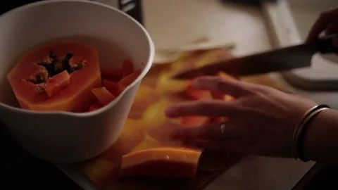 Hands Dice and Prepare Papaya Video stock 76015256