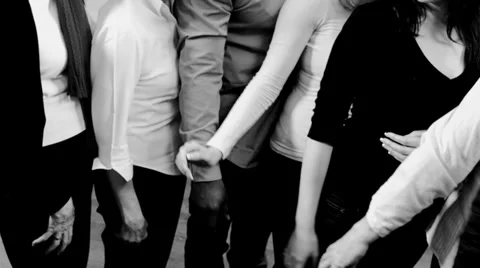 Hands of different age and multiracial background locked in holding each other. Stock-Footage 32721960