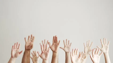 Hands of different colors and sizes on a white background reach up. Forest of Stock Footage 244387216