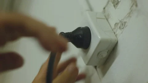 Hands Disconnecting Electric Cables Stock Footage 87869500