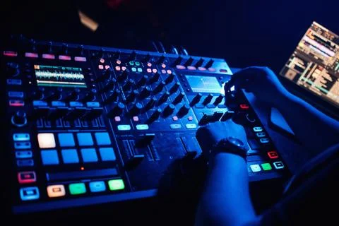 Hands of the DJ on the background of the mixer Stock Photos