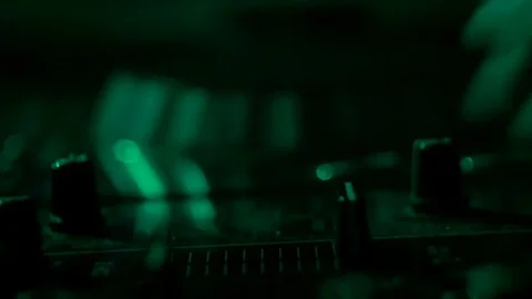 Hands on the DJ console in the light of the lights Stock Footage 81782611