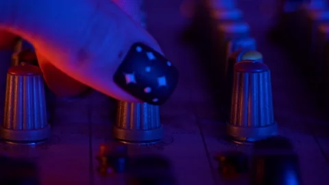Hands of a DJ Man Working with a DJ Mixer Close-up Stock Footage 260467875