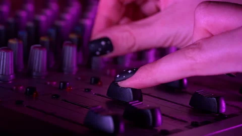 Hands of a DJ Man Working with a DJ Mixer Close-up Stock Footage 260802004