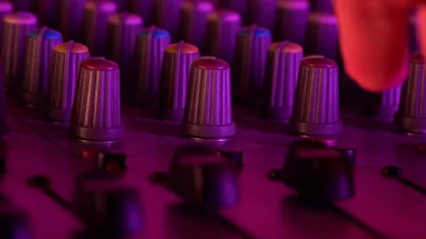 Hands of a DJ Man Working with a DJ Mixer Close-up Stock Footage 263921770