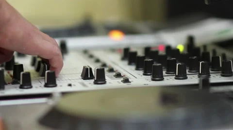 Hands of a DJ on mixing sound board, at a party Vídeo Stock 59667686