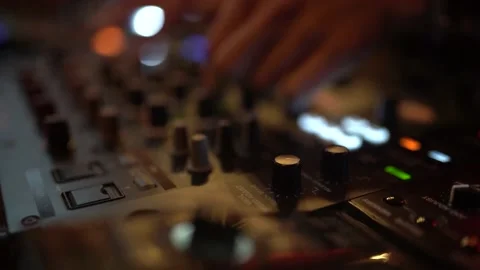 Hands Of Dj Tweak Controls On Record Deck In Night Club SlowMotion 4K Video stock 180357038