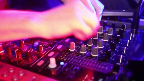 Hands of DJ which mixes music tracks with CD-players and mixer in nightclub 動画素材 71217246