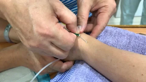 Hands of doctor and nurses taking samples of blood tubes for analysis Stock Footage 135980567