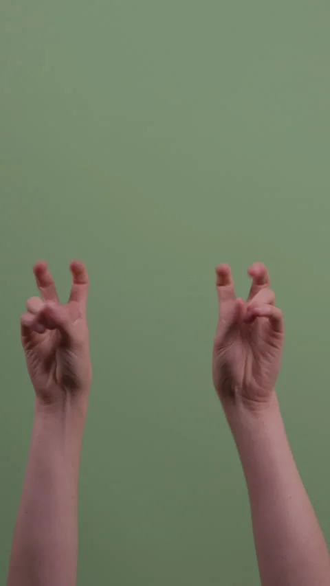 Hands Doing Air Quotes and Turning Multiple Times Stock Footage 208788816