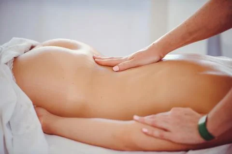 Hands doing massage Stock Photos