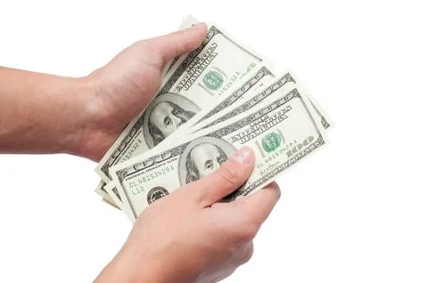 Hands with dollars isolated on a white background Stock Photos