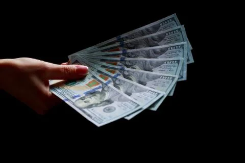 Hands with dollars Photos
