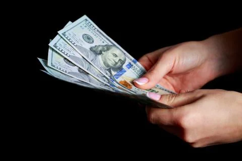 Hands with dollars Photos