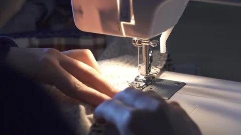 Hands with domestic sewing machine Stock Footage 88572397