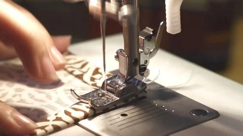 Hands with domestic sewing machine Stock Footage 88572820