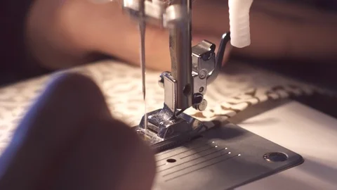 Hands with domestic sewing machine Stock Footage 88574744
