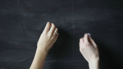 Hands draw on the chalkboard heart Video stock 74534020